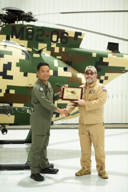 Major Suhairi (Malaysian Army Aviation) and Keith Lacy, Lead Military Pilot (MDHI).