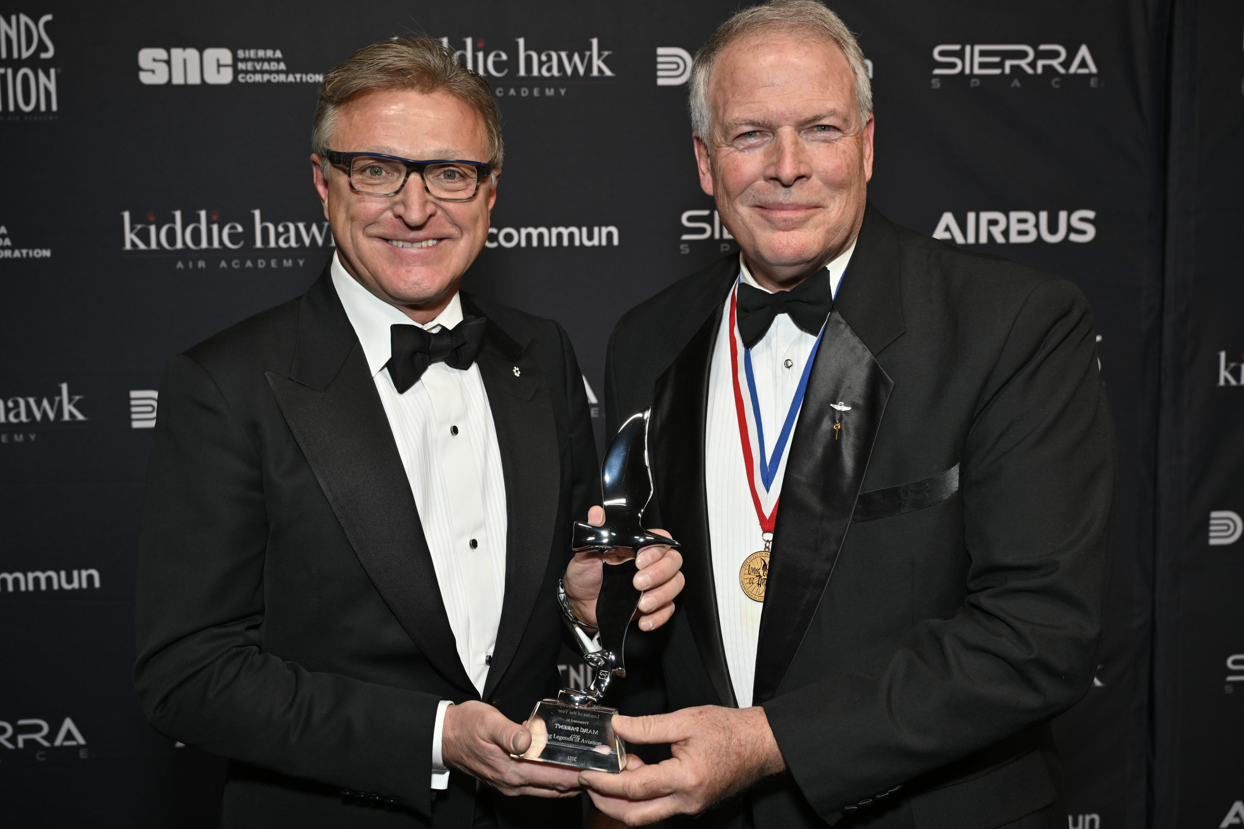 Marc Parent (left), is presented with the award by Pete Bunce, President and CEO of the General Aviation Manufacturer’s Association (GAMA). Photo: 2022 Living Legends of Aviation