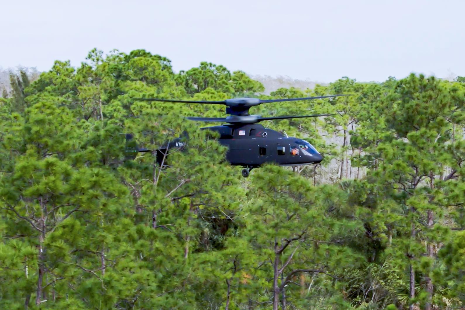 DEFIANT Technology Demonstrator recently executed a confined area landing among the trees in south Florida as part of the Lockheed Martin Sikorsky-Boeing team's effort to validate aircraft design and relevance to the Army's Future Long Range Assault Aircraft mission profile. (Lockheed Martin Sikorsky-Boeing photo)